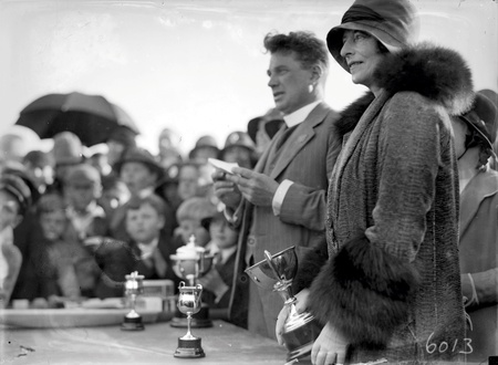 Reverend Doctor William John Edwards, Headmaster of Canberra Grammar School with Lady Stonehaven, wife of  the Govenor General with trophies for  the School  Sports Day at Manuka Oval