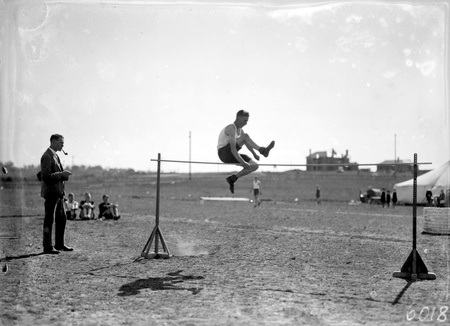 High jumper in action at the Canberra Grammar School Sports Day at Manuka Oval.
