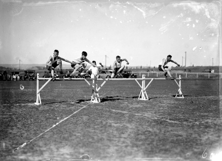 Hurdlers in action at the Canberra Grammar School Sports Day at Manuka Oval.