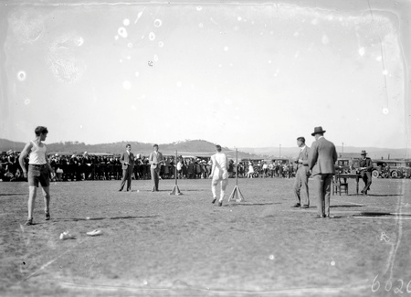 High jumper about to take off at the Canberra Grammar School Sports Day at Manuka Oval.