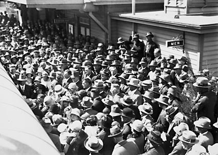 Arrival of Mr  J. H. Scullin newly elected Prime Minister at Canberra  railway station with welcoming crowds