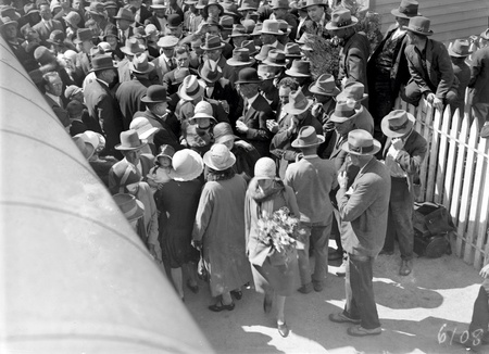Arrival of Mr and Mrs. Scullin at Canberra Railway Station. Part of the welcoming crowd