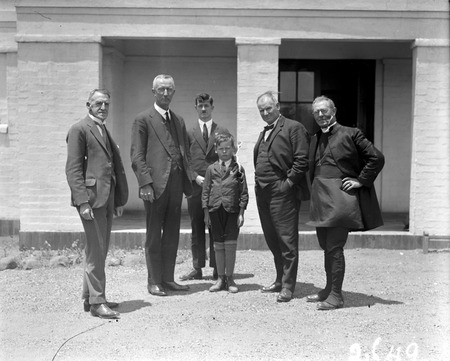 Speech day at Telopea Park School - Bishop Radford, Charles Francis on the right,Cecil Henry,Headmaster behind the boy - Canberra Community News