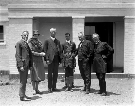 Speech day at Telopea Park School - Bishop Radford, Charles Francis on the right,Cecil Henry,Headmaster behind the boy - Canberra Community News