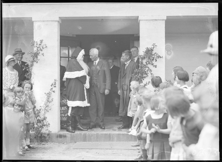 Santa Clause with Headmaster and children at Telopea Park School, New South Wales Crescent, Barton.