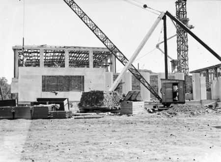 Australian Institute of Anatomy under construction. Fitting the sandstone finish. McCoy Circle, Acton