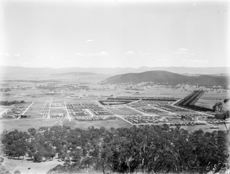 Ainslie, Braddon and Civic Centre. Black Mountain in background, Mount Stromlo on horizon.