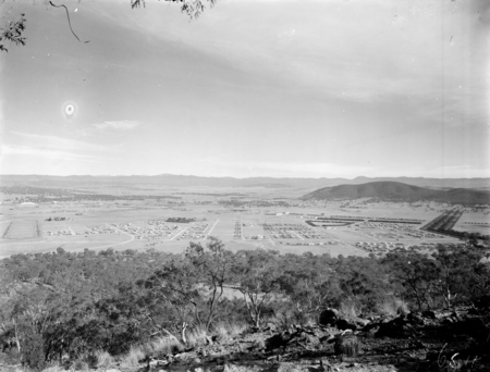Reid, Braddon and Civic Centre from Mt Ainslie. Anzac Parade on the left. Black Mountain at the rear.