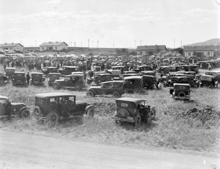 Part of crowd and motor cars at Foundation ceremony for the Roman Catholic Convent, Manuka.