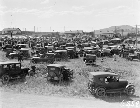 Motor cars parked while the foundation stone of St. Christophers Cathederal was being placed.