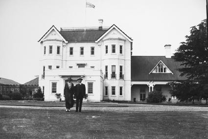 Govenor General, Sir Isaac Isaacs and Lady Isaacs in front of Government House, Yarralumla