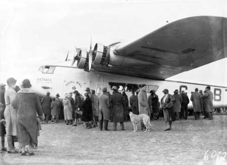 Visit of Imperial Airways Airliner ASTRAEA on a survey flight for proposed air mail service with dog and spectators.
