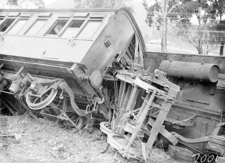 Derailment of the Albury Mail Train at Bowning at 4.30 AM. Train was travelling at 35 MPH and 6 carriages were derailed. 6 passengers were injured. One of the derailed bogies.