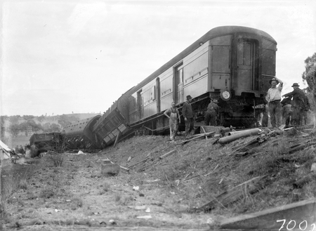 Derailment of the Albury Mail Train at Bowning at 4.30 AM. Train was travelling at 35 MPH and 6 carriages were derailed .6 passengers were injured. The mail van still upright.