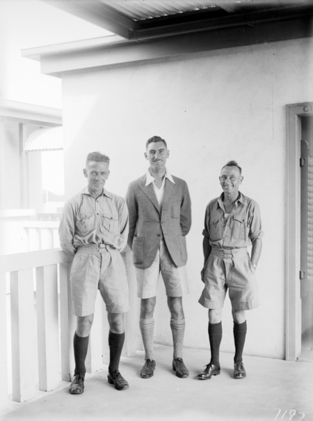 Three unknown men.