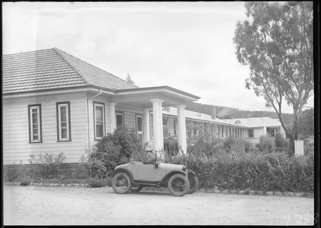 Canberra Community Hospital building with baby Austin 7 Tourer.