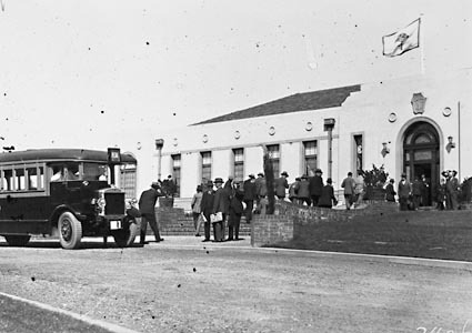 Motor bus delivering passengers to Australian Forestry School - possibly for a Forestry Conference. Banks Street, Yarralumla