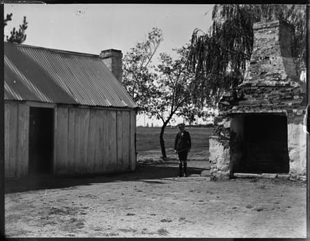 Slab hut and fire place, location unknown.
