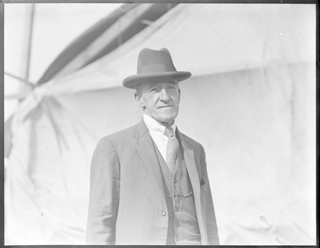 Portrait of an unknown man, taken at a school sports day.
