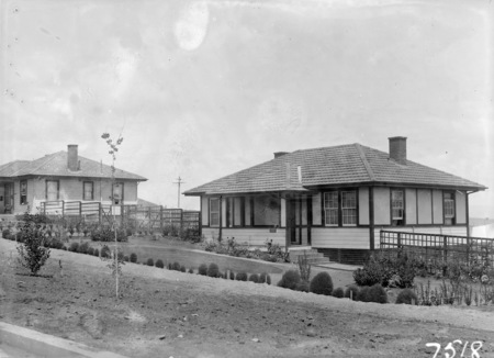 Weatherboard cottages in Ainslie.