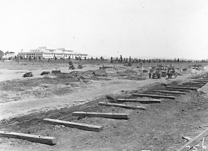 Parliament House from east showing the removal of the brickworks 3 feet six inch gauge railway track between Parliament House and Kingston Power Station