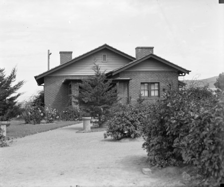 Brick cottage and gardens.