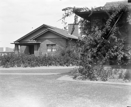 Brick cottage and gardens.
