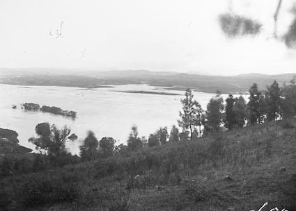 Floodwaters in the Molonglo River valley, looking west