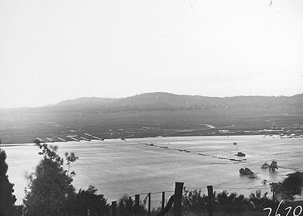 View towards Kingston from Mt Pleasant showing flood waters from the Molonglo River. The Causway cottages on the left