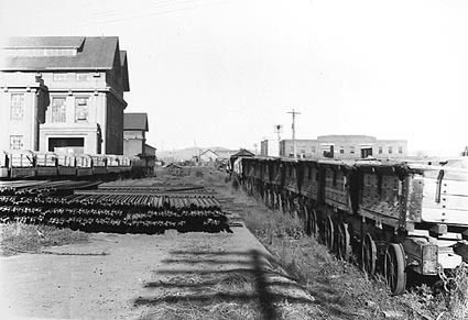 Railway trucks for disposal -rake of brickworks side tipping  trucks at Kingston Power Station