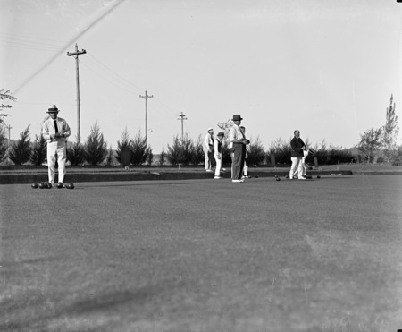 Bowlers on the bowling green at the Hotel Canberra.