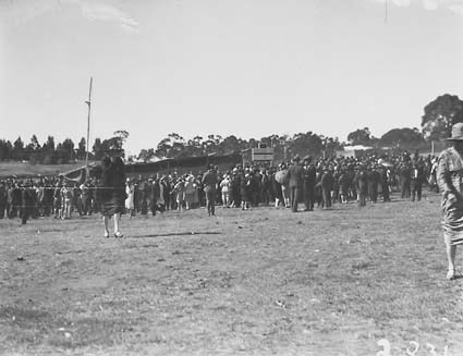 Part of the crowd of race goers at a race meeting, Acton Race Course.
