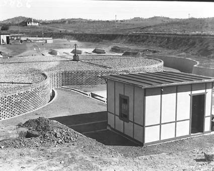 Weston Creek sewerage treatment works. Trickling filters completed with control shed.