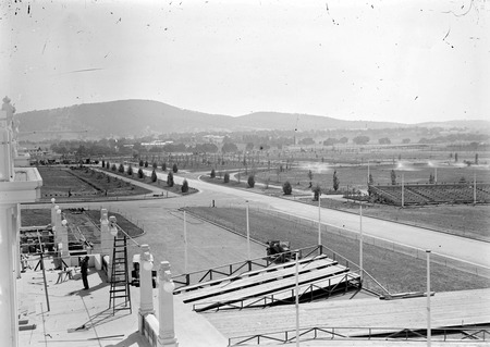 Royal Visit, May 1927 - Entrance to Parliament House from the roof showing spectator's stands looking towards Black Mountain