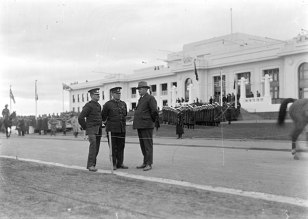 Royal Visit, May 1927. Three police officers, two in uniform and one in plain clothes, outside Parliament House.