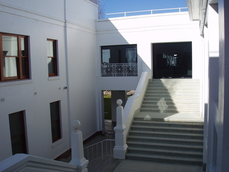 Rear staircase between courtyards showing extension work showing to the left