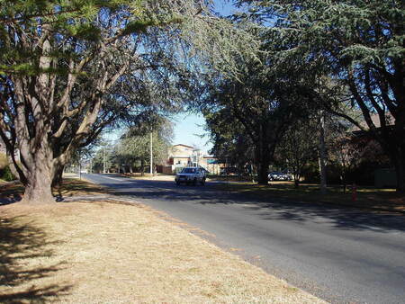 From the corner of Giles and Kennedy sts Kingston, looking towards Manuka (now obscured by trees and apartment buildings)