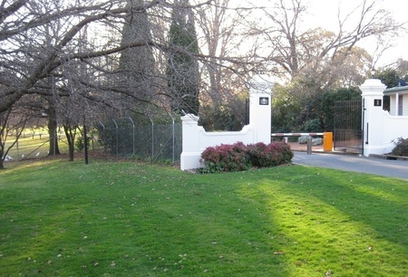 View of some of the Government House gardens from entry point on Dunrossil Drive, Yarralumla