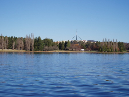 View across Lake Burley Griffin from National Museum, Acton towards Old Parliament House (obscured by trees)