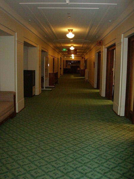 This corridor has since been carpetted but some inhabitants remember the rubber flooring